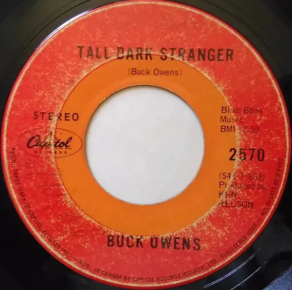 Buck Owens : Tall Dark Stranger / Sing That Kind Of Song (7")