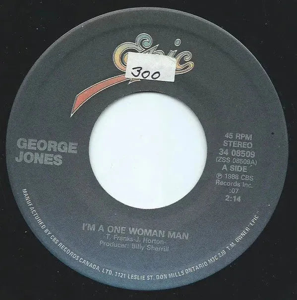 George Jones (2) : I'm A One Woman Man / Pretty Little Lady From Beaumont Texas (7", Single)