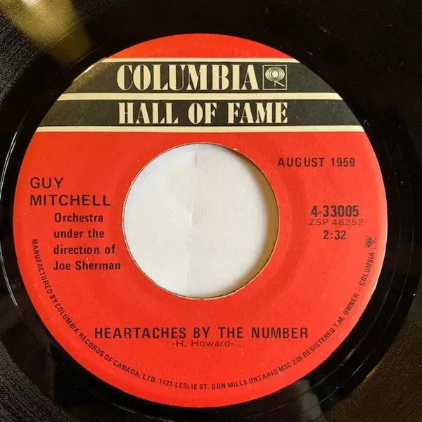 Guy Mitchell : Singing The Blues / Heartaches By The Number (7", RE)