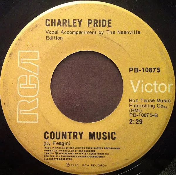 Charley Pride : She's Just An Old Love Turned Memory / Country Music (7")