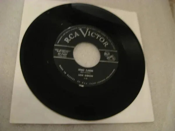 Don Gibson : Who Cares / A Stranger To Me (7", Single)