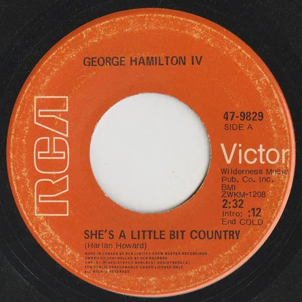 George Hamilton IV : She's A Little Bit Country (7", Single)