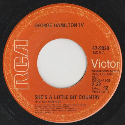 George Hamilton IV : She's A Little Bit Country (7", Single)