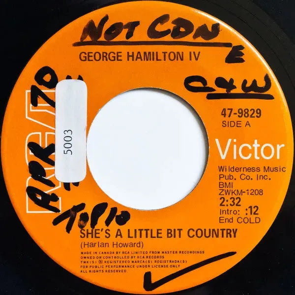 George Hamilton IV : She's A Little Bit Country (7", Single)