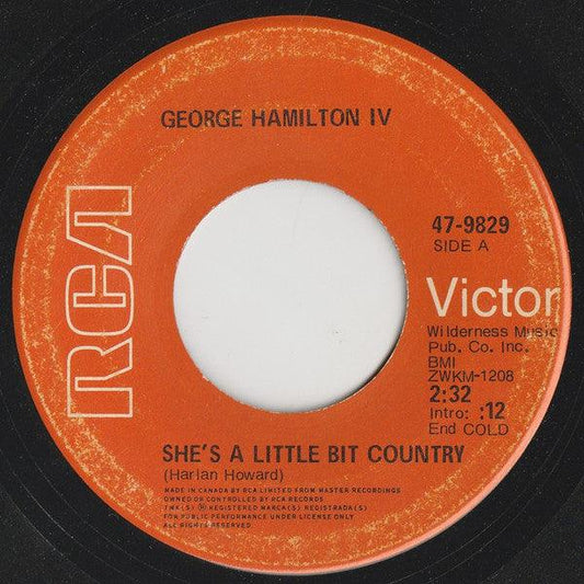 George Hamilton IV - She's A Little Bit Country (7", Single) - 75music